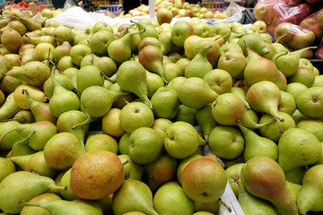 Fresh organic pears for a sale at a farmers market