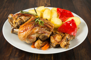 Cordero asado con patatas