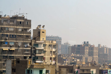 a communication tower on the roof of the building