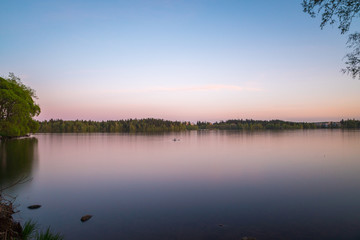 Fototapeta na wymiar Sunset over the lake in Finland