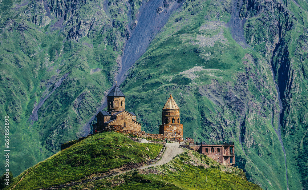 Poster One of the foremost Georgian landmarks - Tsminda Sameba church (english: Holy Trinity) near Gergeti town