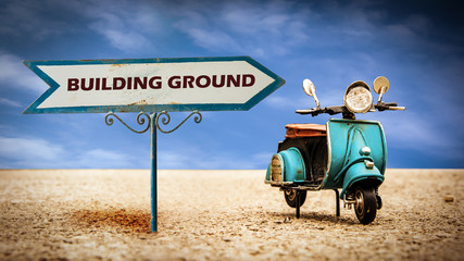 Naklejka premium Street Sign BUILDING GROUND