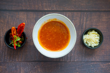 Sauce for Shabu shabu style with side dish on wood table