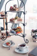 Beautiful english afternoon tea ceremony with desserts