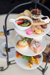 Beautiful english afternoon tea ceremony with desserts