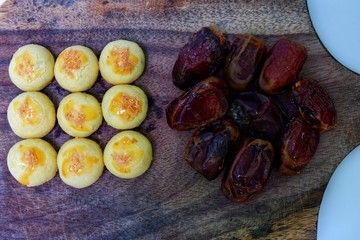 dates and nastar on a wooden table