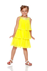 Little girl is jumping.