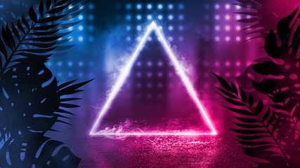 Background of empty dark scenes with neon lights and shapes, smoke. Silhouettes of tropical palm leaves in the foreground. Bright futuristic abstract background