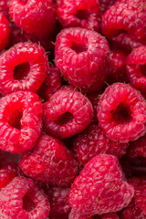 Fresh and sweet raspberries background