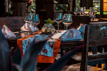 Rustic table set up. Vintage table arrangment on old wooden background.