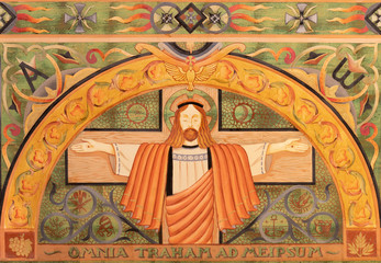 BELAGGIO, ITALY - MAY 10, 2015: The paint on the main altar on the wood - Jesus on the corss in church Chiesa di San Giacomo  from 20. cent.