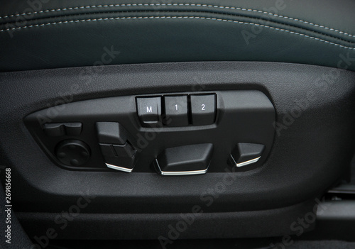 Buttons for adjusting seat position