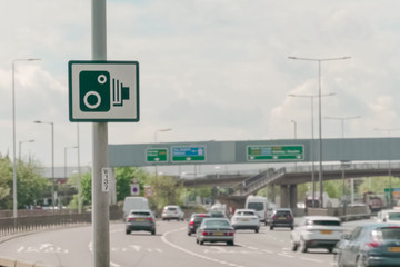 Highway interchange and speed camera sign for use for background