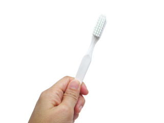 Woman hand holding toothbrush isolated on white background