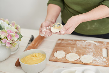 Obraz na płótnie Canvas cooking food, cooking ravioli with potatoes, healthy vegetarian food