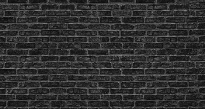 Black brick wall texture. Old rough brickwork. Dark grunge background