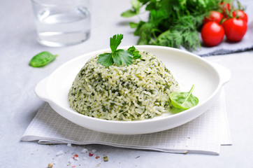 Spinach Rice on a Plate over Bright Background