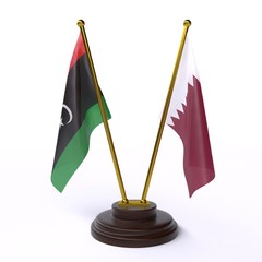 Libya and Qatar, two table flags isolated on white background. 3d image