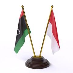 Libya and Indonesia, two table flags isolated on white background. 3d image