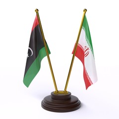 Libya and Iran, two table flags isolated on white background. 3d image