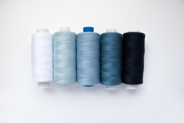 blue threads on white background