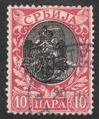 Portrait of king Alexander I Obrenovich,overprint state emblem, stamp Serbia circa 1903