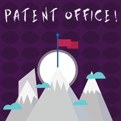 Writing note showing Patent Office. Business concept for a government office that makes decisions about giving patents Three High Mountains with Snow and One has Flag at the Peak