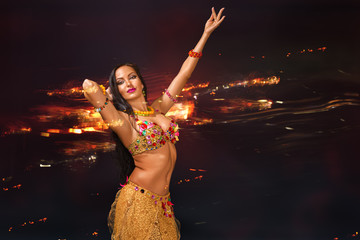 Young woman performing belly dance