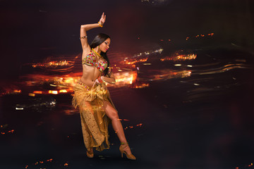 Young woman performing belly dance