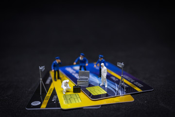 Miniature people : Police And Detective finding proof from credit card in crime scene, Cyber crime...