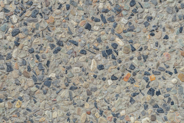 The stone floor is decorated with many pieces