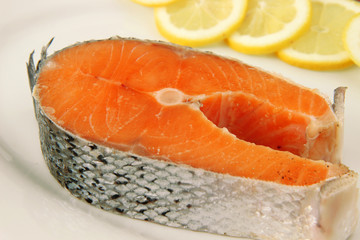 fresh raw salmon on white plate