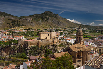 Fototapeta na wymiar Church of the Incarnation with Moorish Alcazaba and Gorda Peak at Loja Granada Spain
