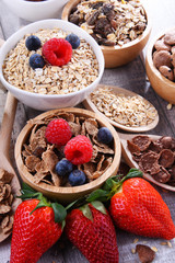 Bowls with different sorts of breakfast cereal products