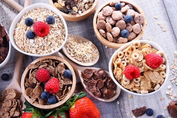 Bowls with different sorts of breakfast cereal products