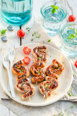 Hot sausage with spices and herbs in summer