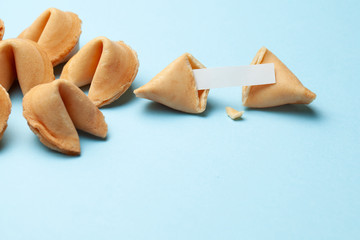 Chinese fortune cookies. Cookies with empty blank inside for prediction words. Blue background Copy space for text.