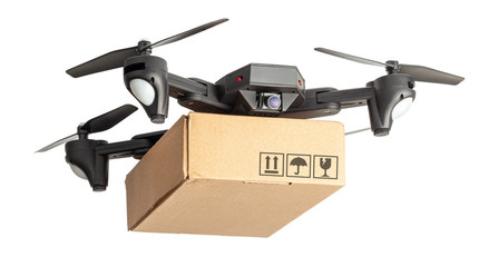 Drone with a cardboard box makes delivery by air. Drone with a camera carries postal parcel....
