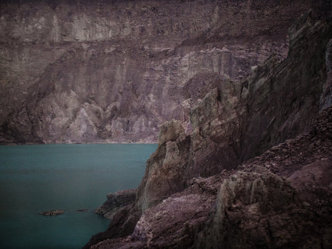 Inside a volcanic crater with sulfur lake