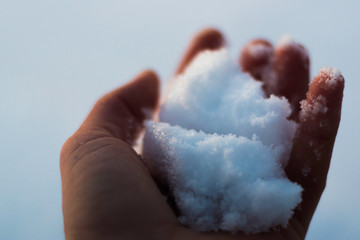 hand with snow