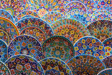 Colorful pottery dishes sold in Dubai souk, Unied Arab Emirates