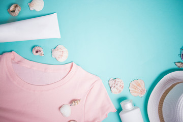 Beach accessories on blue background