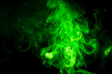 Green smoke on black background