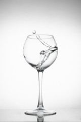 Water splashing in the luxury wine glass