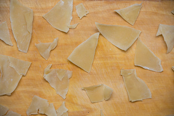 dry dough for a dish on a cutting board