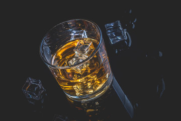 Whisky, whiskey or bourbon with ice