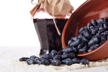 Ripe honeysuckles in a bowl.