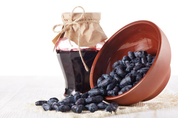 Ripe honeysuckles in a bowl.
