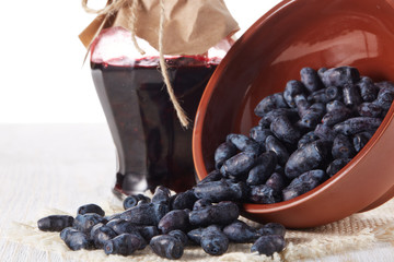 Ripe honeysuckles in a bowl.