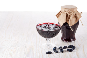 Ripe honeysuckles and jam.